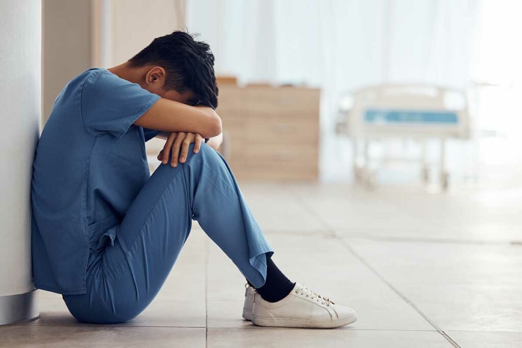 Doctor having a Panic Attack at Work