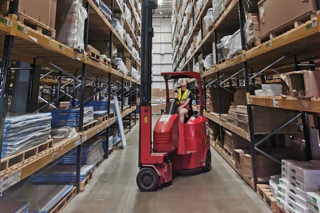 Pivot Steer Truck ina Warehouse during Training Session