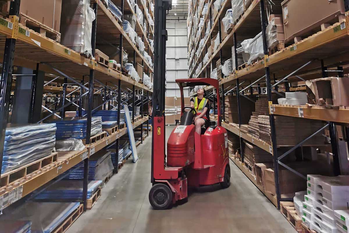 Pivot Steer Truck ina Warehouse during Training Session